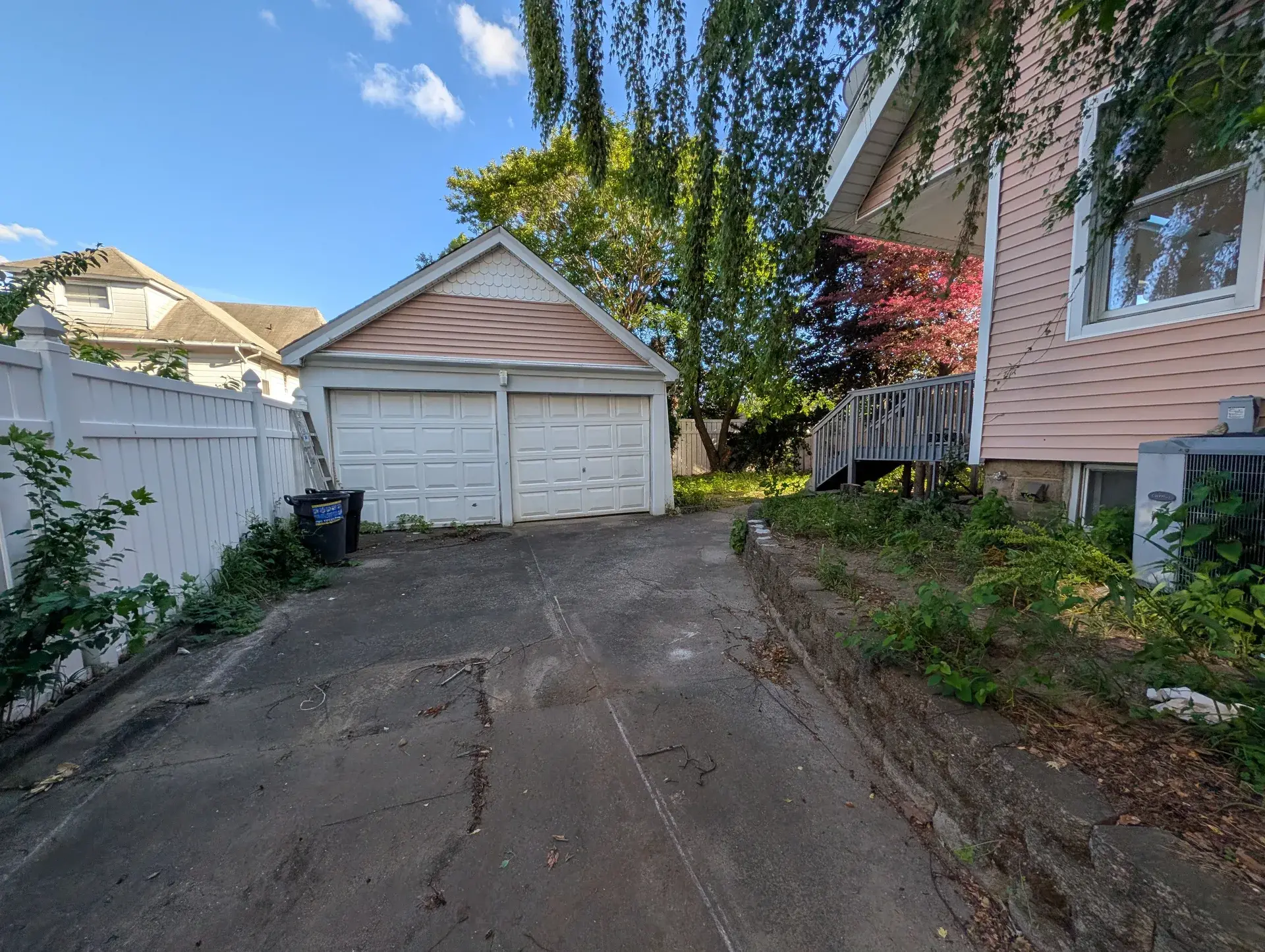 The garage at the end of the long private driveway